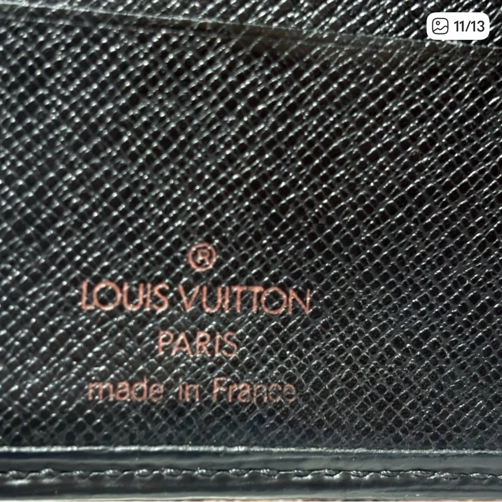 Louis Vuitton EPI black with logo stamp